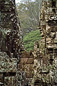 Angkor Thom - Bayon temple, second enclosure, corner towers seen from the central terrace 